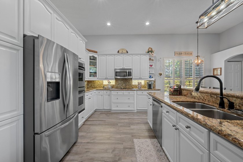 BETTER THAN NEW! Beautifully upgraded 4BR/2.5BA home in Oakmont - photo 8