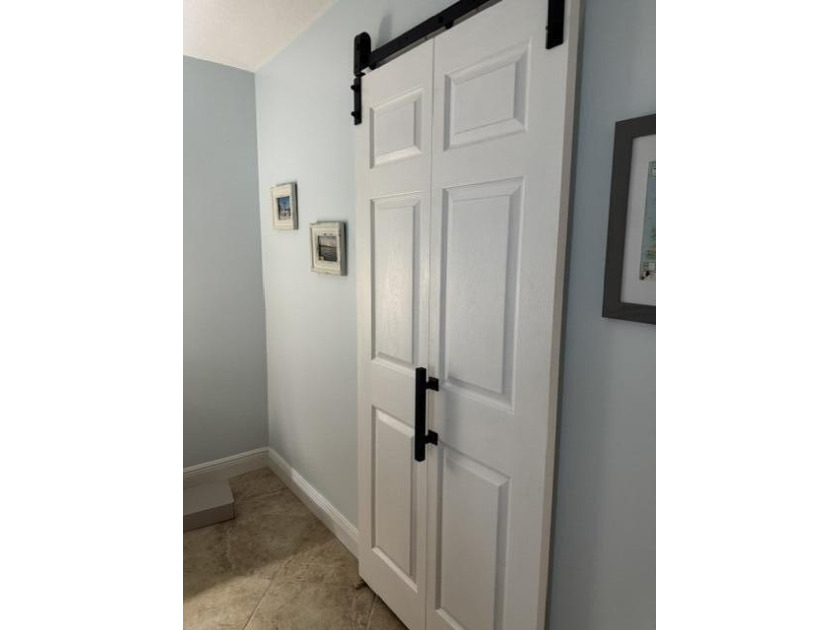 Welcome to this charming two-bedroom, two-bathroom condominium - photo 3