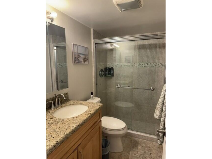 Welcome to this charming two-bedroom, two-bathroom condominium - photo 7