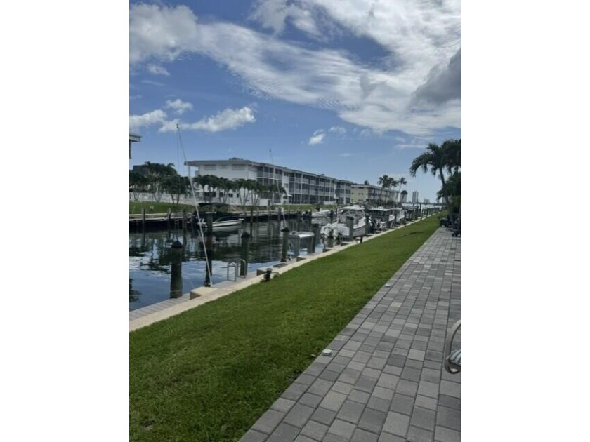 Welcome to this charming two-bedroom, two-bathroom condominium - photo 10