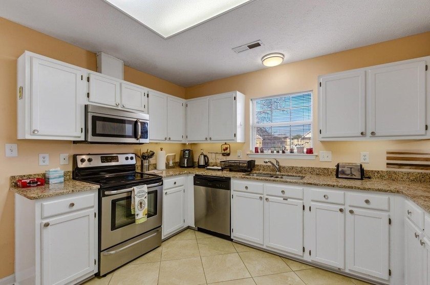 Welcome to 306 Pilot House Drive A Charming Home nestled in the - photo 11