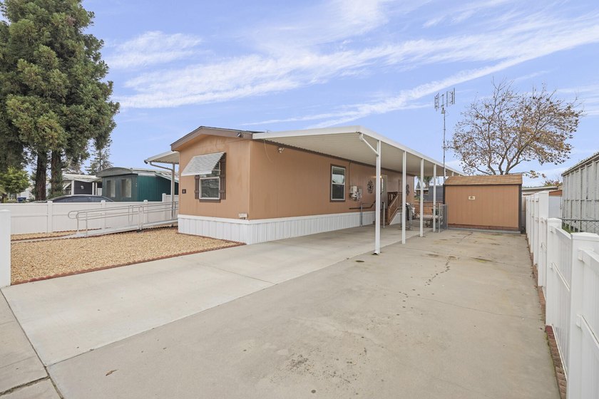 Located in a well-maintained 55+ senior community in Tulare - photo 2