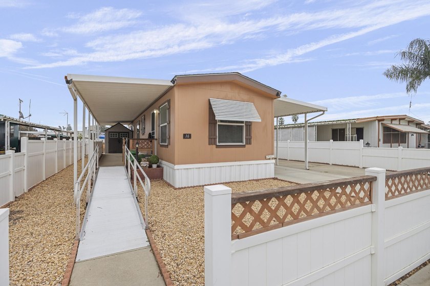 Located in a well-maintained 55+ senior community in Tulare - photo 3