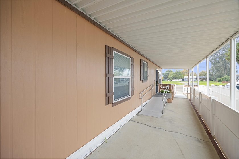 Located in a well-maintained 55+ senior community in Tulare - photo 7