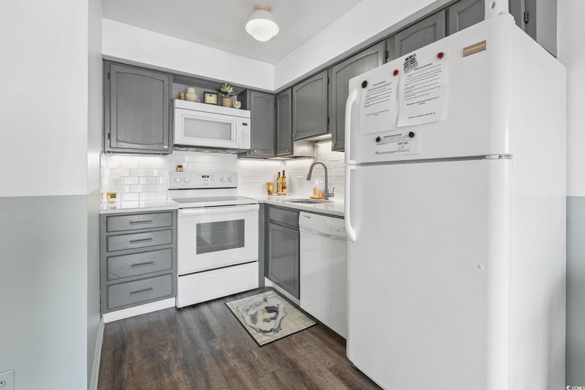 Discover your perfect beachside escape! This move-in ready - photo 15