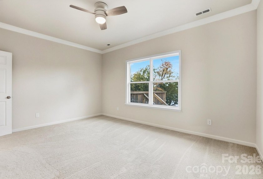 Live the Lake Life Every Day! This stunning waterfront home on - photo 19