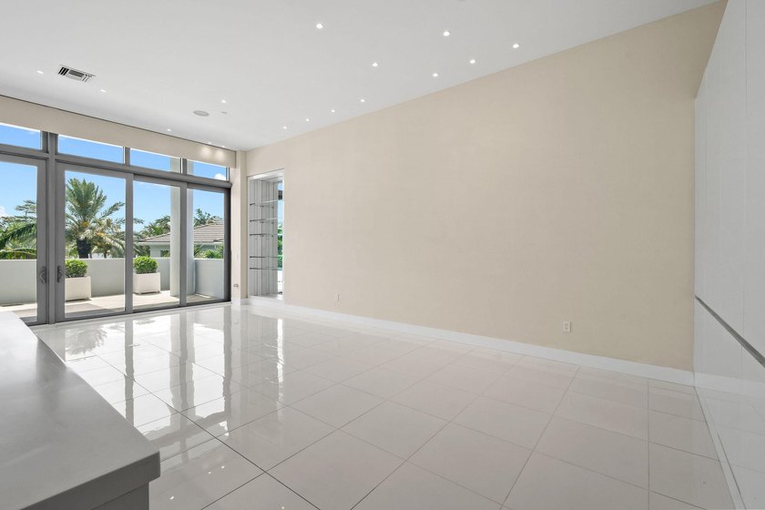 Step through the lobby level entry into ceilings that hold at - photo 9