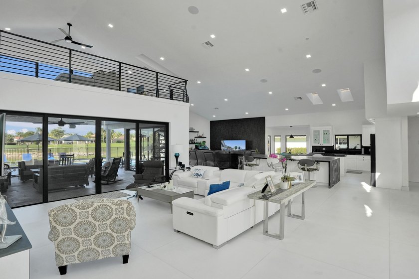 Experience refined South Florida living in this fully renovated - photo 7