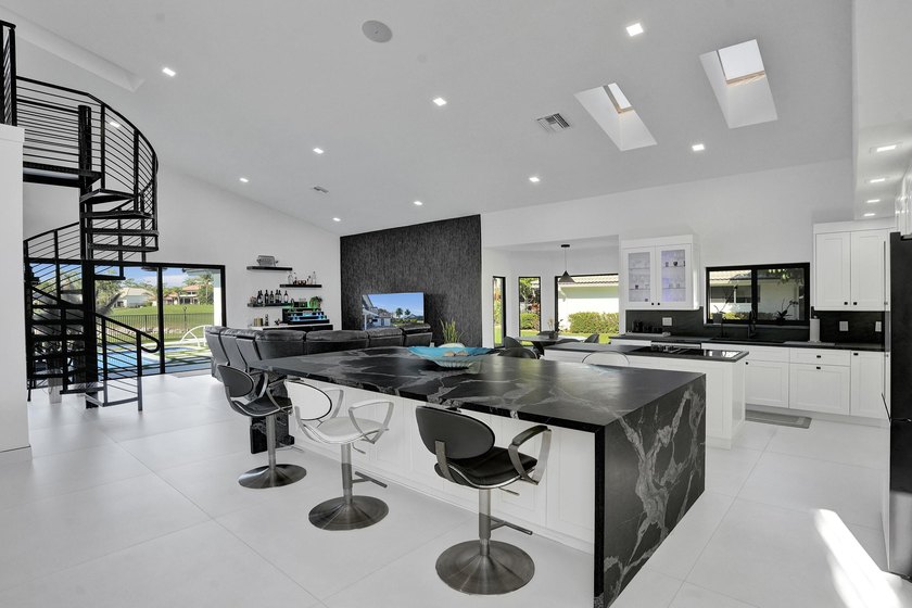 Experience refined South Florida living in this fully renovated - photo 8