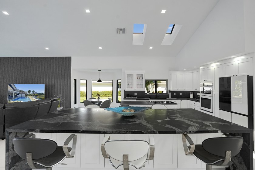 Experience refined South Florida living in this fully renovated - photo 9