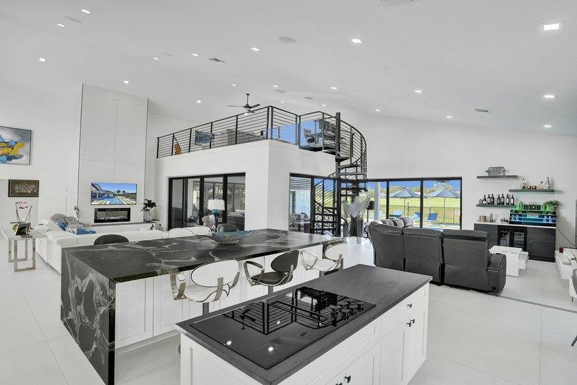 Experience refined South Florida living in this fully renovated - photo 10