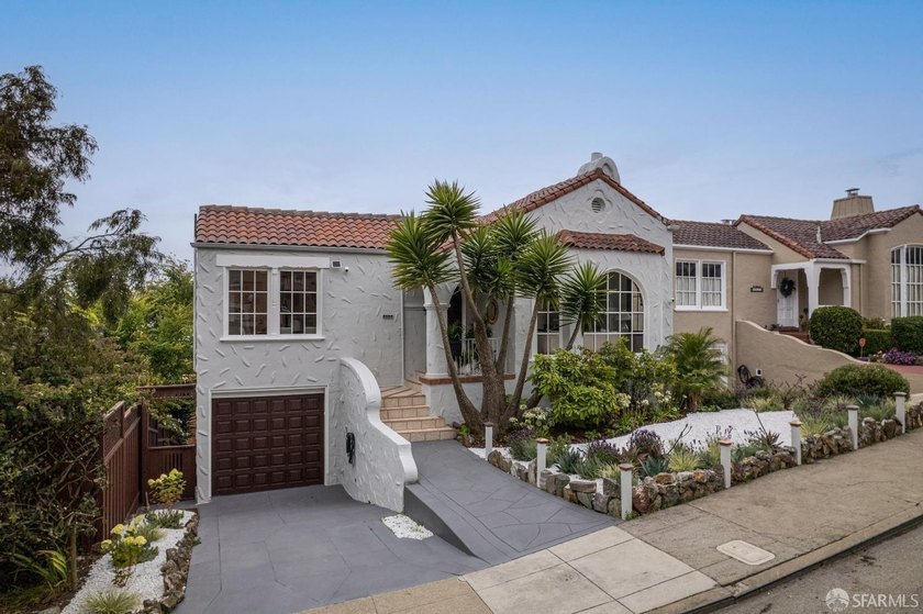 This handsome, storybook Spanish Mediterranean view home is - photo 2