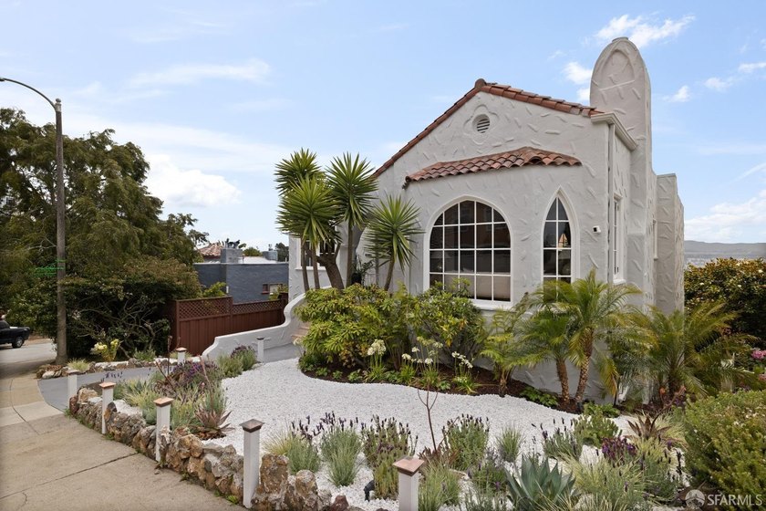 This handsome, storybook Spanish Mediterranean view home is - photo 4