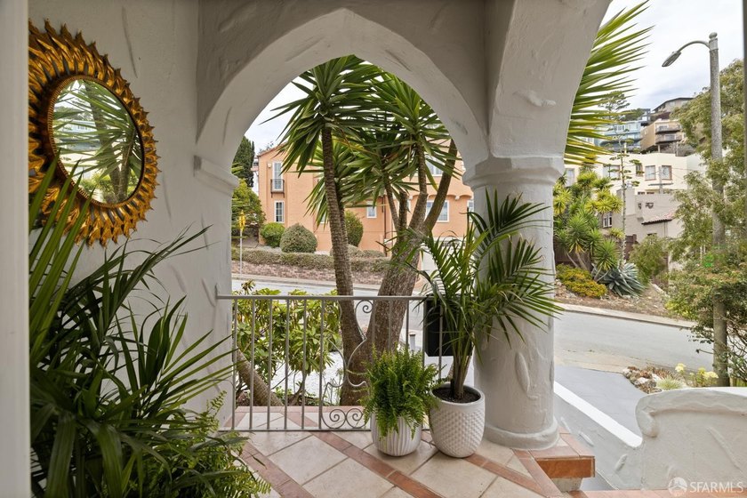 This handsome, storybook Spanish Mediterranean view home is - photo 8