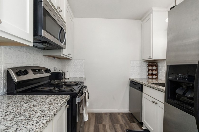 Full of charm, this inviting 3-bedroom, 2-bath home is proof - photo 12