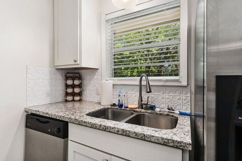 Full of charm, this inviting 3-bedroom, 2-bath home is proof - photo 13