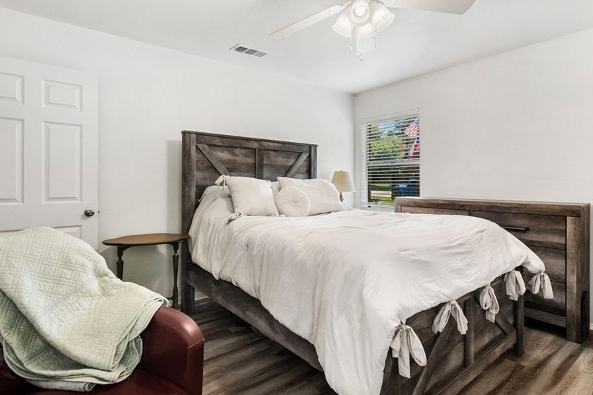 Full of charm, this inviting 3-bedroom, 2-bath home is proof - photo 23
