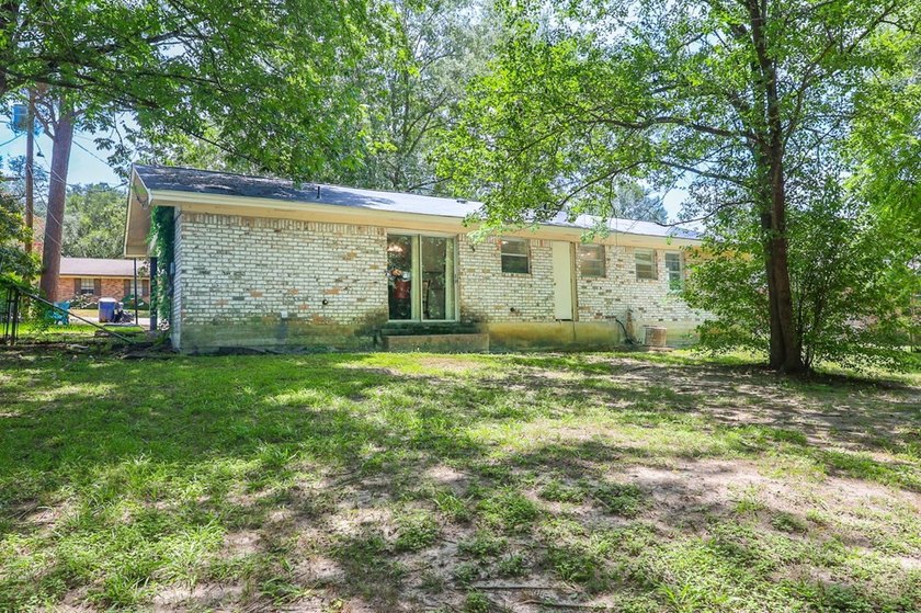 Full of charm, this inviting 3-bedroom, 2-bath home is proof - photo 28