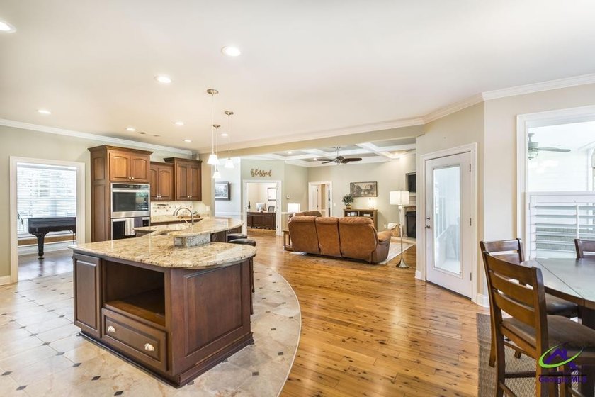 Welcome home to this stunning custom-built, four-sided brick - photo 12
