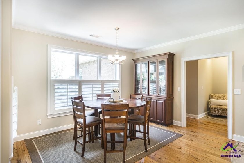 Welcome home to this stunning custom-built, four-sided brick - photo 14