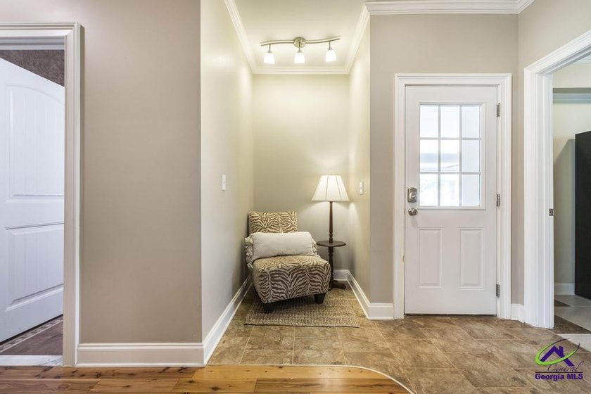 Welcome home to this stunning custom-built, four-sided brick - photo 16