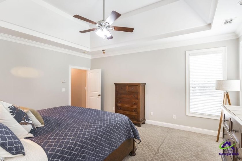Welcome home to this stunning custom-built, four-sided brick - photo 20
