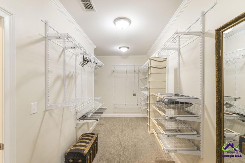 Welcome home to this stunning custom-built, four-sided brick - photo 25