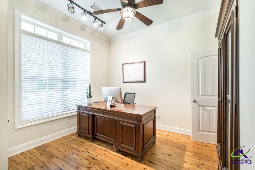 Welcome home to this stunning custom-built, four-sided brick - photo 26