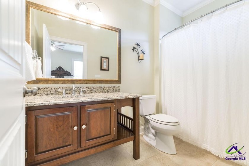 Welcome home to this stunning custom-built, four-sided brick - photo 32