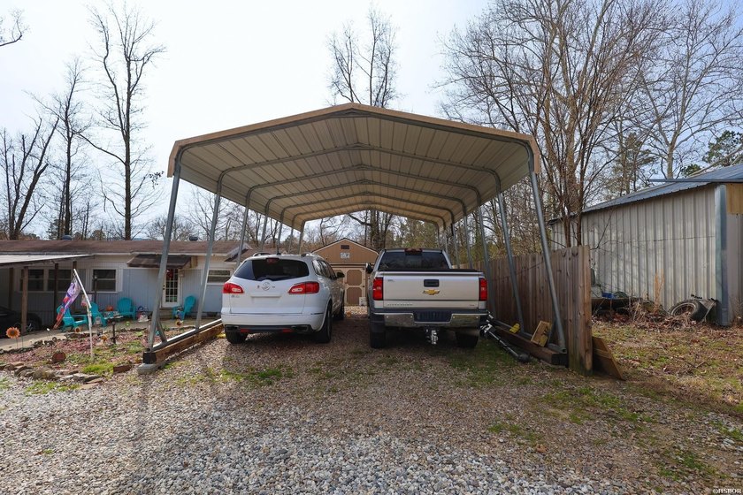 Conveniently located near Lake Greeson and area ATV trails, this - photo 32