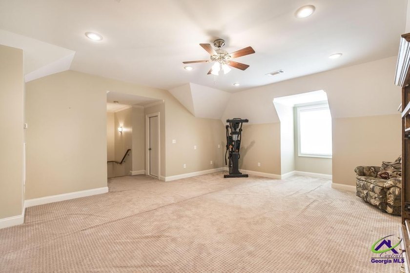 Welcome home to this stunning custom-built, four-sided brick - photo 35