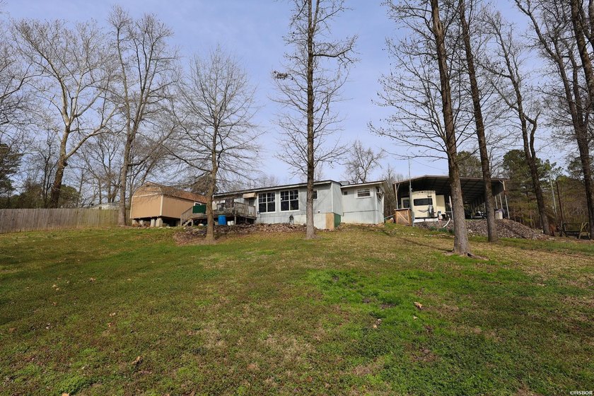 Conveniently located near Lake Greeson and area ATV trails, this - photo 35