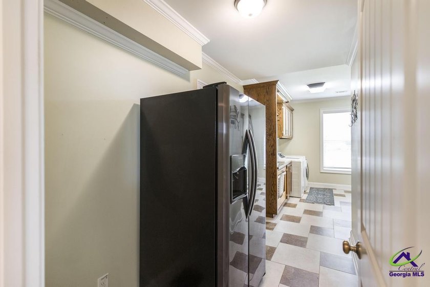 Welcome home to this stunning custom-built, four-sided brick - photo 38