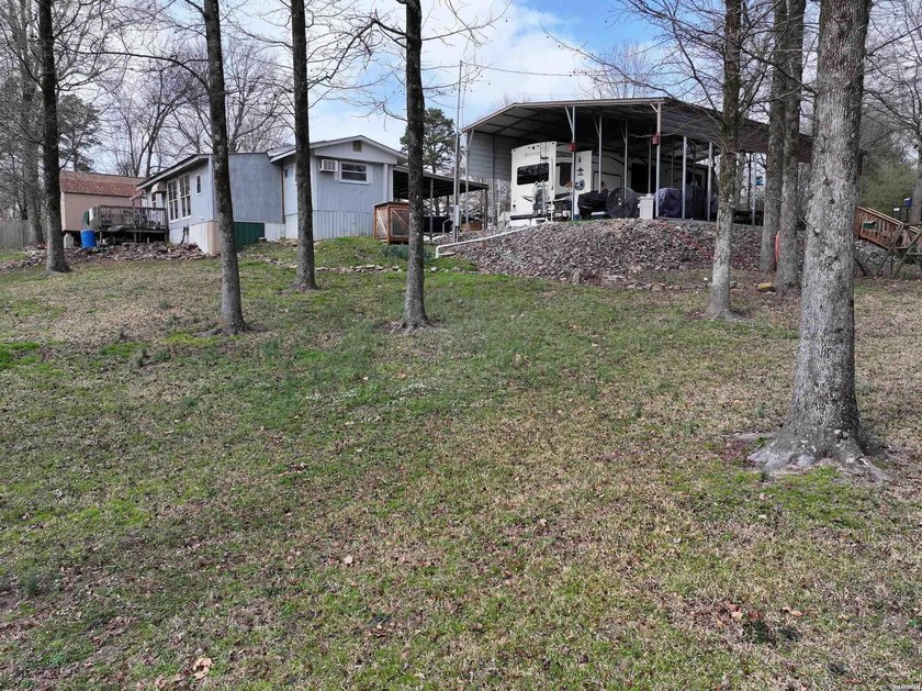 Conveniently located near Lake Greeson and area ATV trails, this - photo 39