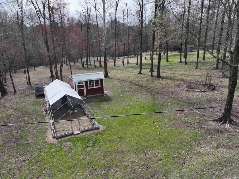 Conveniently located near Lake Greeson and area ATV trails, this - photo 43