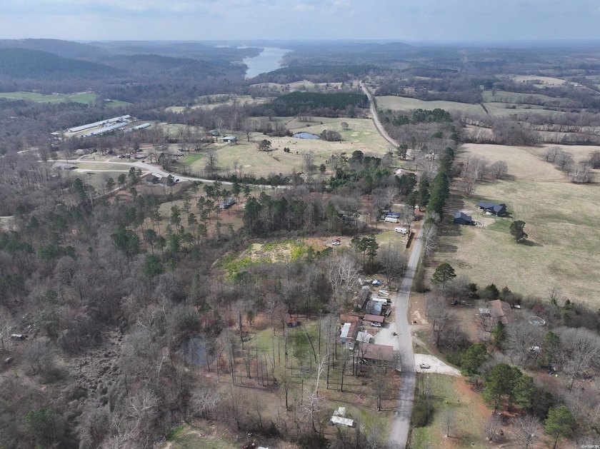 Conveniently located near Lake Greeson and area ATV trails, this - photo 44