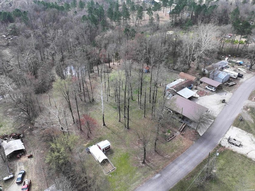 Conveniently located near Lake Greeson and area ATV trails, this - photo 46