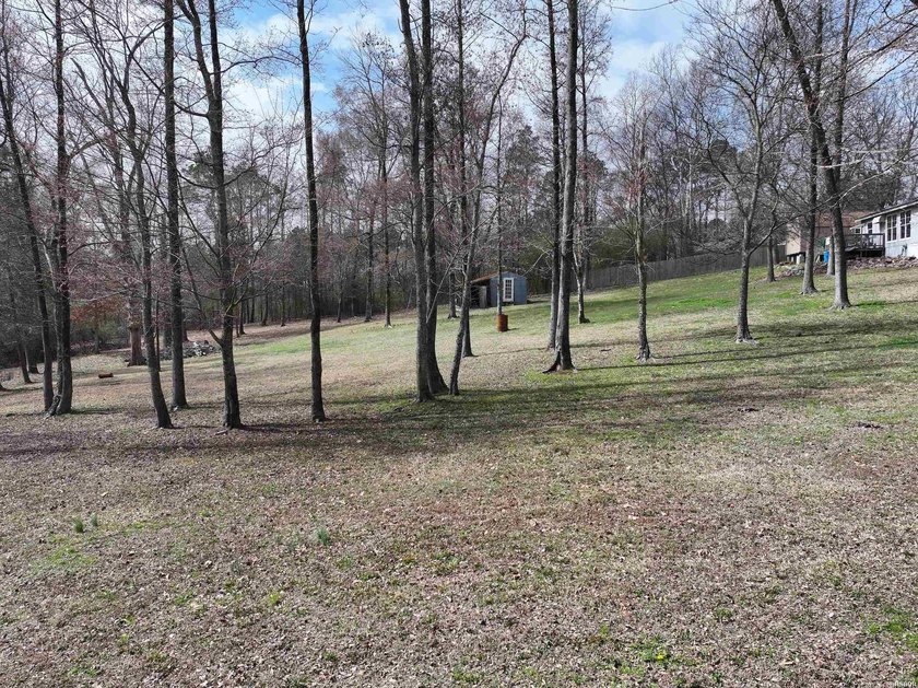 Conveniently located near Lake Greeson and area ATV trails, this - photo 48