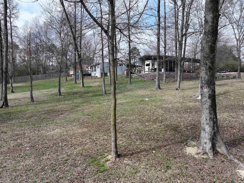 Conveniently located near Lake Greeson and area ATV trails, this - photo 49