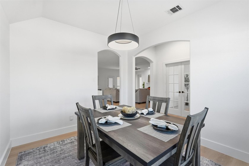 Step into a home that feels instantly welcoming-open, bright - photo 9