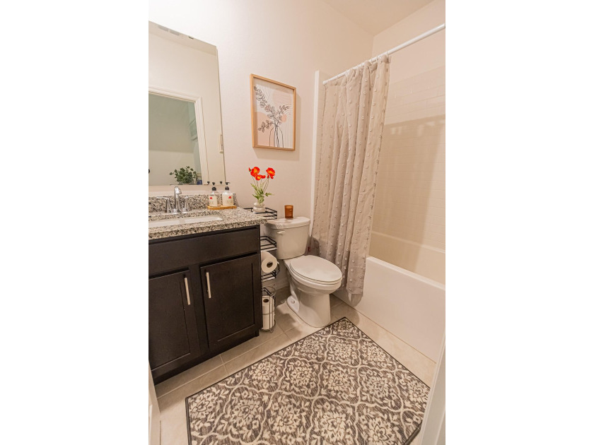 Built in 2023, this 3/2/2 CBS home perfectly combines modern - photo 10
