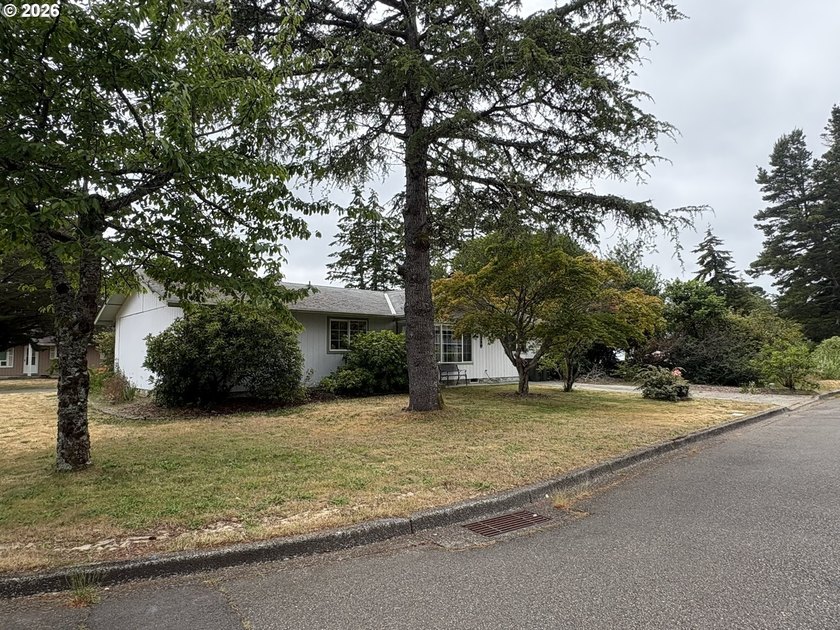 This 3 bedroom, 2 bath home is situated on a spacious in-town - photo 2