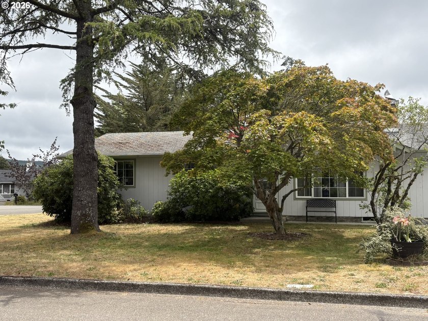 This 3 bedroom, 2 bath home is situated on a spacious in-town - photo 3