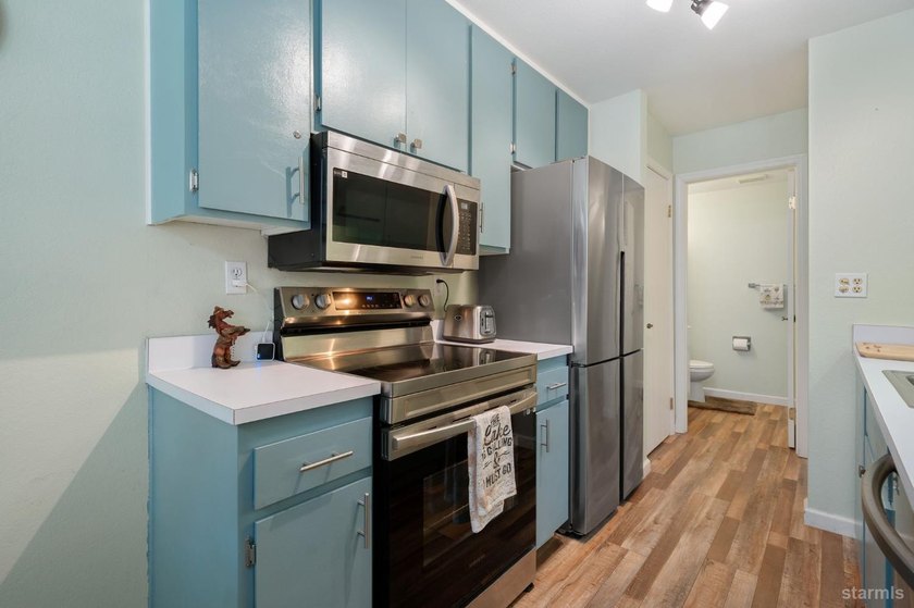 This turnkey 2-bedroom, 1.5-bath condo offers the ideal blend of - photo 7