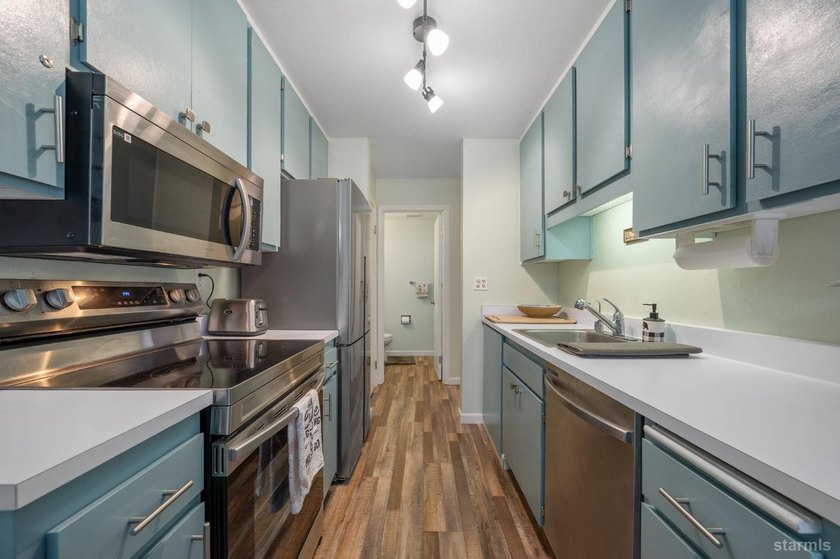 This turnkey 2-bedroom, 1.5-bath condo offers the ideal blend of - photo 9