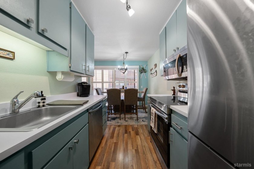 This turnkey 2-bedroom, 1.5-bath condo offers the ideal blend of - photo 10