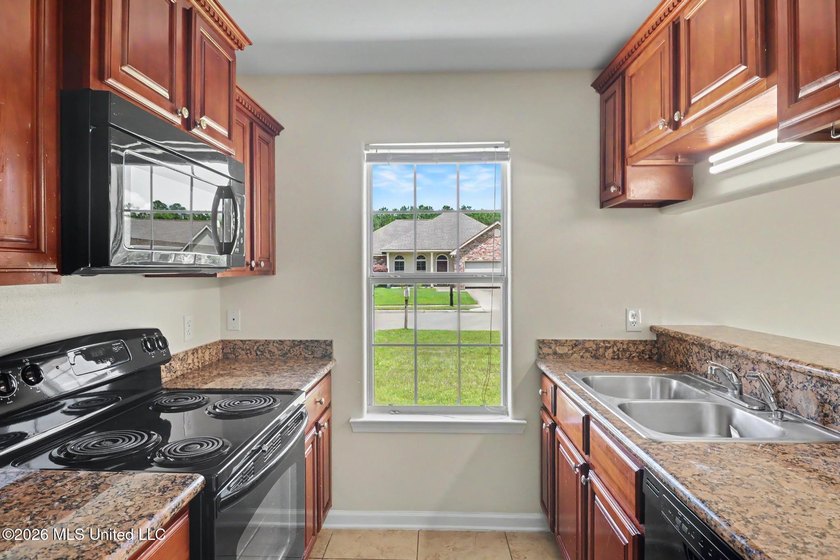 New to the market! This inviting 3-bedroom, 2-bath home offers a - photo 18