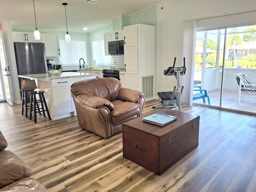 Fully furnished 2/2 home featuring a modern remodeled kitchen - photo 10