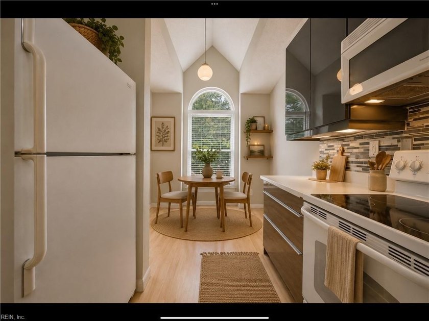 Welcome home to this bright and inviting condo conveniently - photo 11