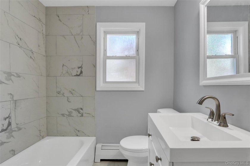 Outstanding and updated Cape Cod style home with gorgeous curb - photo 12